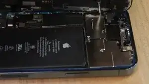 After completing the proximity sensor installation, reconnect the display ribbon cables, followed by the battery ribbon. Ensure all connections are secure and properly aligned. Once verified, reinstall the protective cover and fasten the screws carefully to avoid over-tightening.
