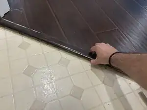 How to Fix a Loose Wooden Door Threshold
