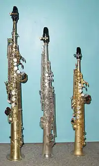 B♭ soprano saxophone (left), C soprano saxophone (center), E♭ sopranino saxophone (right)